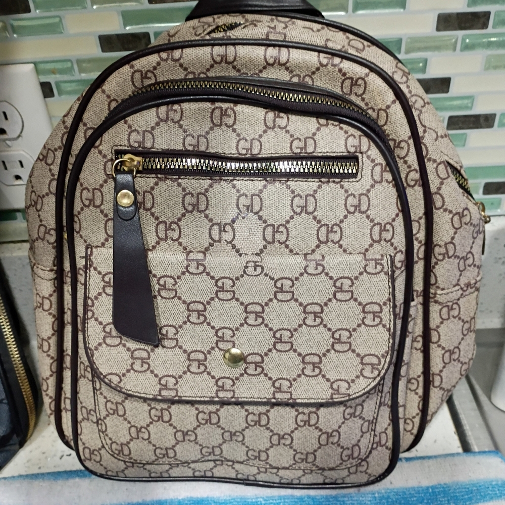 Patterned Brown Backpack - image 1